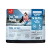 Back of Orijen Original Freeze-Dried Dog Treats bag showing guaranteed analysis, ingredients, calorie content, and lifestyle image of woman with dog